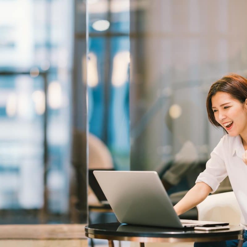 Beautiful Asian girl celebrate with laptop, success pose, education or technology or startup business concept, with copy space